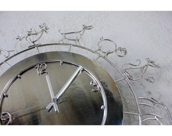Escultura de reloj de pared de metal: diseño animal, acabado níquel