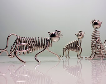 Tiger figurines (symbol of the year 2022) of series «TIME WHIRL» are made using the author's technique, from metal in electroplated nickel