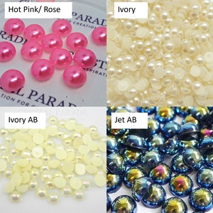 May include: Assortment of round, flat-backed embellishments in four colors: hot pink, ivory, ivory with an iridescent finish, and blue with an iridescent finish. The embellishments are arranged in four squares with the color name above each square.