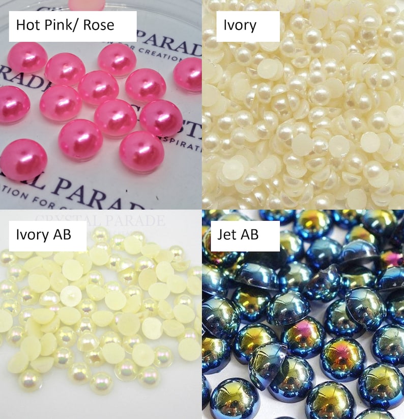 May include: Assortment of round, flat-backed embellishments in four colors: hot pink, ivory, ivory with an iridescent finish, and blue with an iridescent finish. The embellishments are arranged in four squares with the color name above each square.