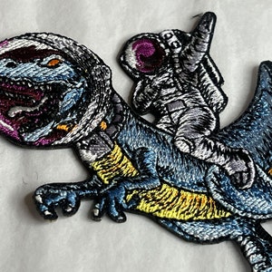 Medium Spaceman on a T-Rex Iron-On Embroidery Patch - Astronaut & Dinosaur in Space Iron-On Patch - Cute Surreal Embroidered Patch #B111