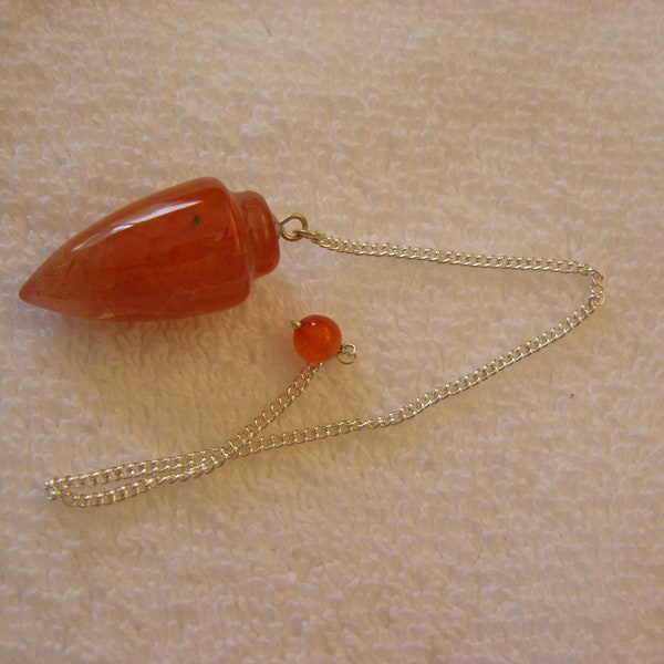 Carnelian crystal pendulum on silver chain with holding bead