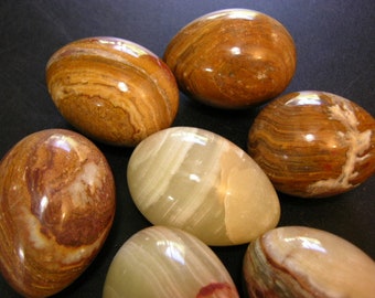 Onyx egg hand carved polished 3 inches long from banded onyx 1 egg w/ring stand per winner