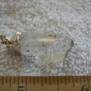 Quartz crystal point pendant with silver bail 3/4-1.25 inch DG22
