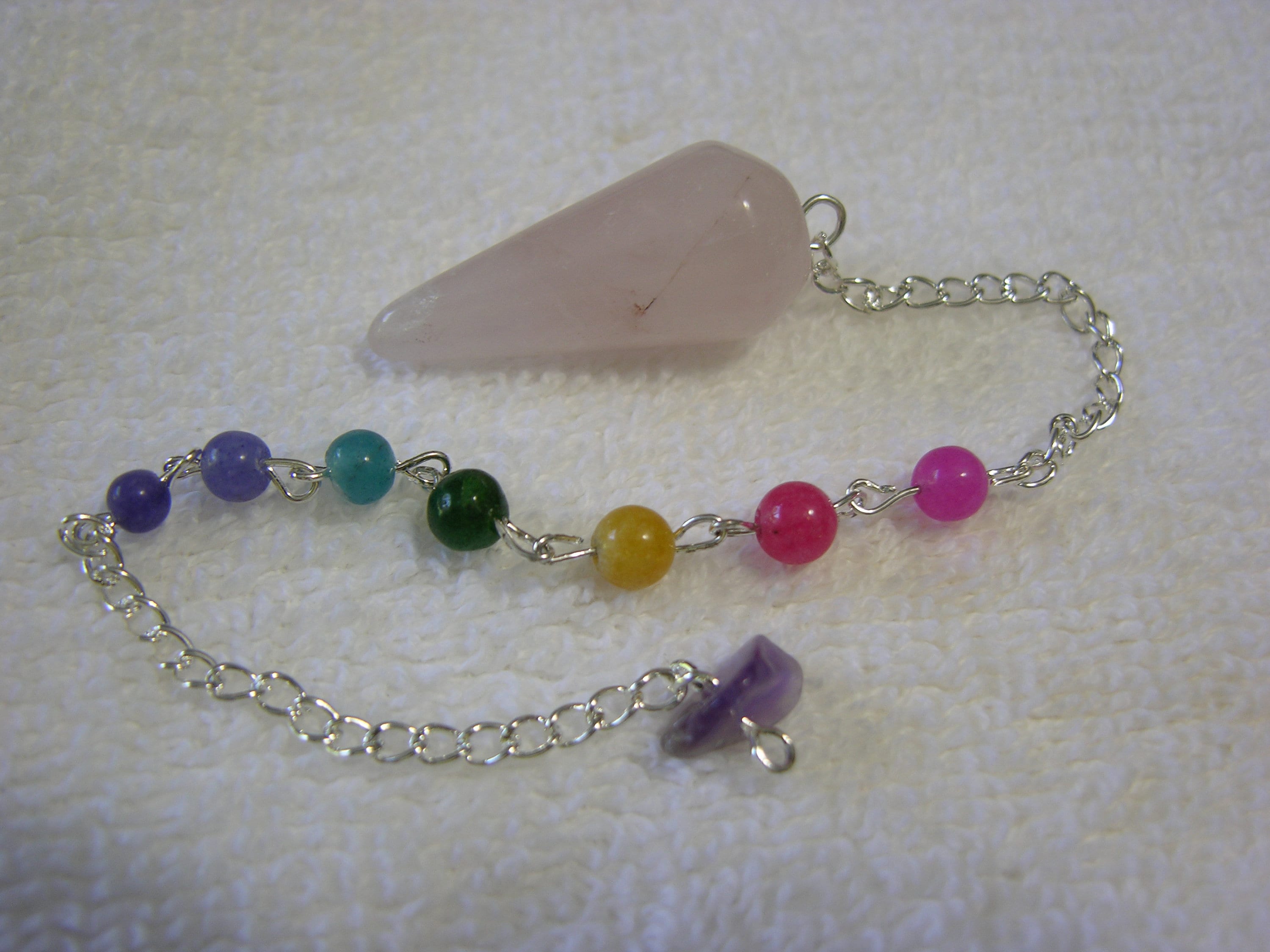 Rose Quartz Crystal pendulum with Chakra stones silver chain and hold…