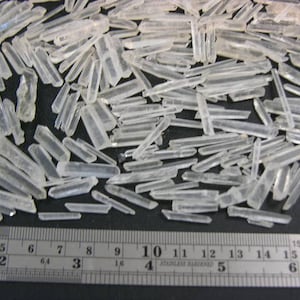 Clear Quartz terminated needle crystals 1.5 - 0.5 inch 1 ounce lots