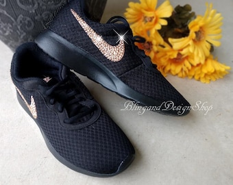 black nike rose gold swoosh