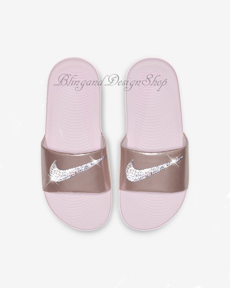 girls pink nike sliders