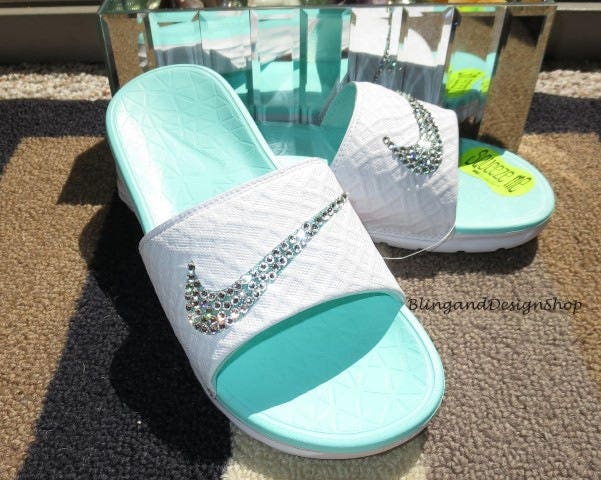 teal nike slides