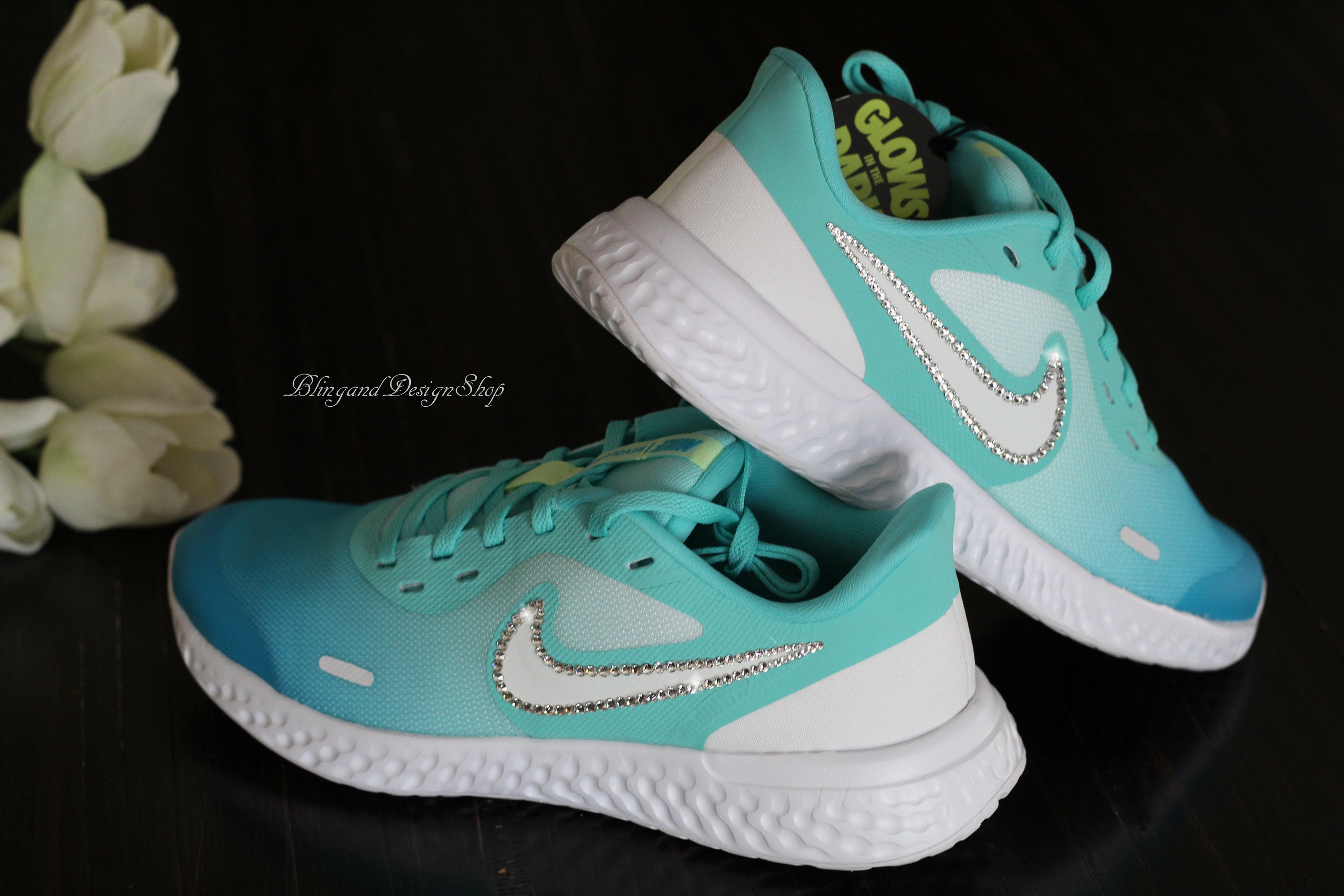 nike revolution teal