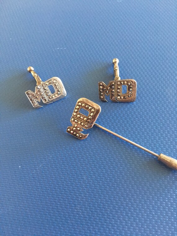 Sterling 50 yrs old marcasite cuff links and stick