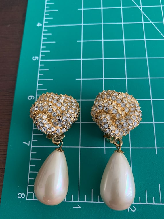 Stunning, pearl and rhinestone clip earrings award