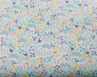 Floral Fabric with snails and butterflies by Fabric Finders