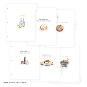 May include: A set of white binder dividers labeled Bank A - Mini Deluxe Tabs. Each divider features watercolor illustrations of food and drinks with text labels including Drinks, Breakfast and Baked Goods, Sandwiches, Condiments and Sauces, Appetizers and Snacks, and Salads.