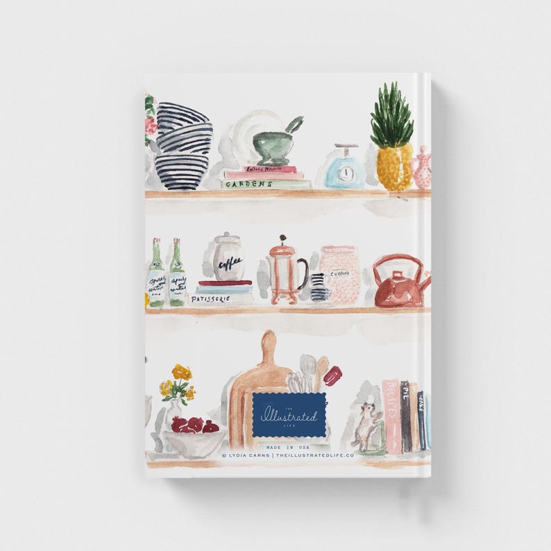 May include: A watercolor illustration of a kitchen shelf with various items, including a pineapple, coffee pot, books, and a cutting board. The text "The Illustrated Life" is visible on the cutting board.