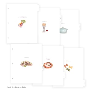 May include: White tabbed dividers with watercolor illustrations of food categories. The tabs include "Vegetables," "Sides," "Soups," "Tacos," "Pizza," and "Pasta." The text "Bank B - Deluxe Tabs" is at the bottom.