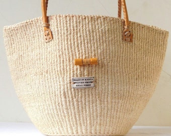 Kiondo Basket; Lovely Sisal Tote Bag in White with Brown Leather Straps.