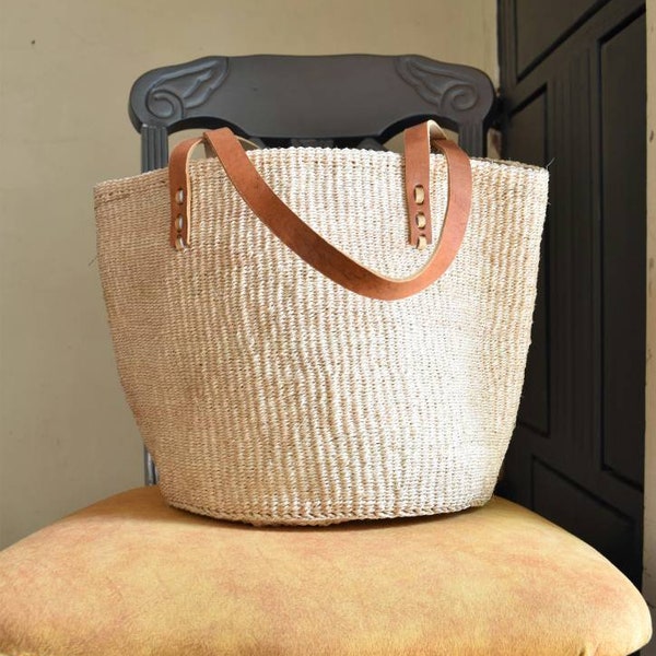 Handwoven sisal kiondoo basket bag in natural colors