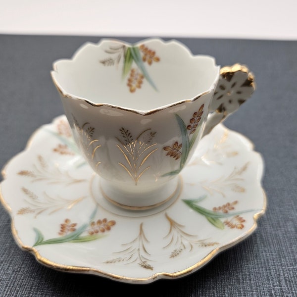 Mini Japan tea cup and saucer With Flowers And Gold Trim Ucagco Vintage