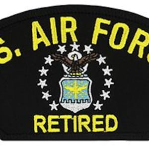 May include: Black patch with yellow embroidered text "U.S. AIR FORCE RETIRED" and a blue and white Air Force emblem with a star-shaped border.