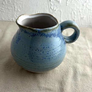 Bloomingville Creamer Pitcher, blue and white, 4 1/2&quot; tall, 5&quot; across from handle to spout, 4&quot; diameter at widest point, marked