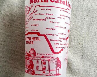 Vintage North Carolina Drinking Glass, frosted with pink lettering, preowned