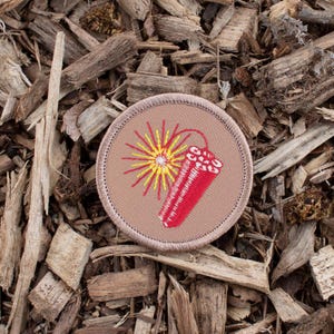 Dynamite Patch (046) – 2 Inch Diameter Embroidered Patch