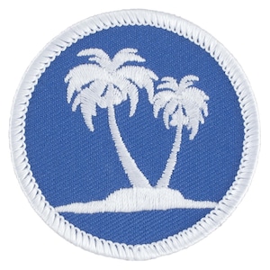 May include: A blue and white embroidered patch featuring two palm trees on a small island. The patch has a white border.