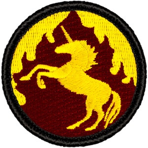 May include: A yellow embroidered unicorn on a maroon background with a black border. The unicorn is facing right and has a single horn.