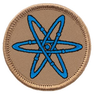 May include: A brown embroidered patch with a blue atom symbol in the center.