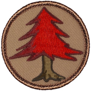 May include: A brown embroidered patch with a red and brown tree design. The tree has a brown trunk and a red crown with brown outlines.