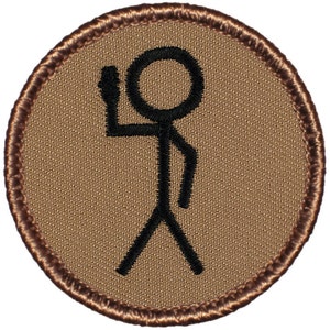 May include: A brown embroidered patch with a stick figure raising a hand in a salute. The patch has a brown border.