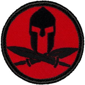 May include: Red embroidered patch with a black Spartan helmet and crossed swords.