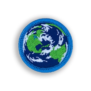 May include: A blue and green embroidered patch depicting a globe with white clouds. The patch has a blue border with white stitching.