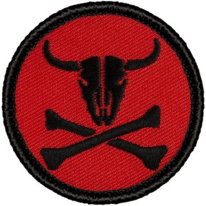 May include: Red embroidered patch with a black skull and crossbones. The skull has horns and is a bull's skull.