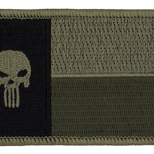 May include: A black and green embroidered patch with a skull and crossbones design. The skull is white and the crossbones are black. The patch has a stitched border.