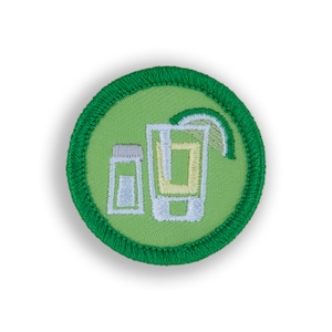 May include: A green embroidered patch with a white outline of a shot glass with a lime wedge and a small bottle of tequila.