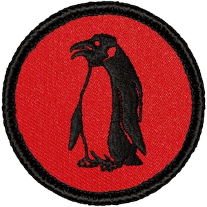 May include: A black embroidered penguin silhouette on a red background with a black border. The patch is circular.