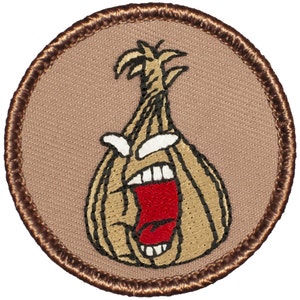 May include: A brown embroidered patch with a cartoon onion with a brown, white, and red face. The onion is yelling with its mouth open and its eyes wide.