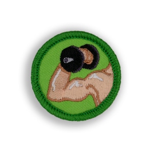 May include: Green embroidered patch with a cartoon image of a bicep lifting a dumbbell.