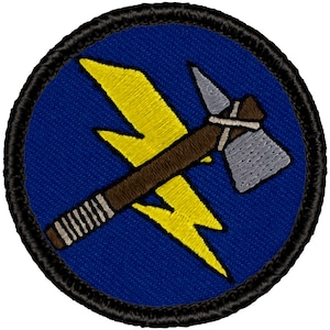 May include: A blue embroidered patch with a yellow lightning bolt and a brown and grey tomahawk.