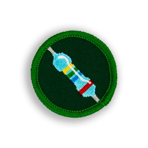May include: Green embroidered patch with a white outline. The patch features a blue and white resistor with red, yellow, and green bands.