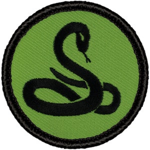 May include: A green embroidered patch with a black snake design. The snake is coiled and has its head raised.