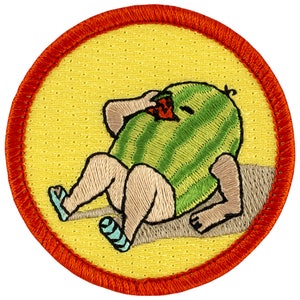 May include: A round embroidered patch with a red border. The patch features a cartoon of a person wearing a watermelon costume, sitting down and eating a slice of watermelon.
