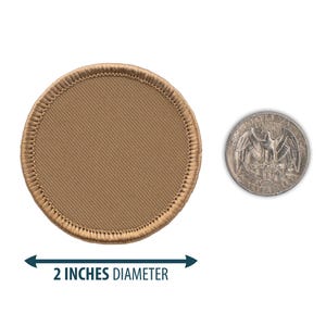 May include: A 2-inch diameter, round, tan-colored patch with a stitched edge. The patch is shown next to a US quarter for size comparison.