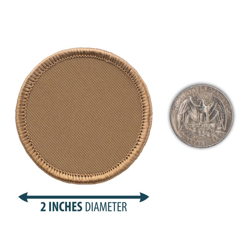 May include: A 2-inch diameter, round, tan-colored patch with a stitched edge. The patch is shown next to a US quarter for size comparison.