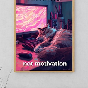 May include: A framed digital art print featuring a sleeping cat on a desk with a computer monitor. The monitor displays a pink and purple image. Text on the print reads "I need rest, not motivation."