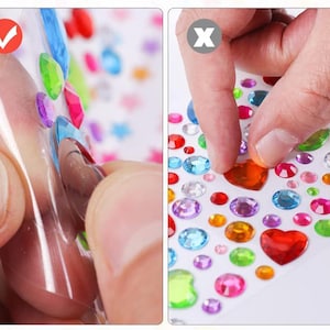 May include: Sheets of colorful, self-adhesive rhinestones in various shapes and sizes. The gems are in shades of red, orange, green, blue, purple, and clear. The image shows how to peel the rhinestones from the sheet.