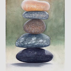 May include: A stack of five smooth, round stones in various shades of grey, brown, and beige, balanced on top of each other. The stones are arranged in a pyramid shape, with the largest stone at the bottom and the smallest stone at the top. The background is a soft, blurred green.