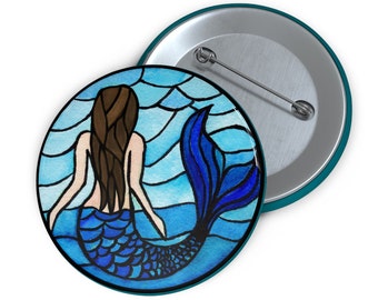 Stained Glass Mermaid Button! 2.25" pinback button of a blue mermaid in a stained glass beachy style. Perfect for party favors!